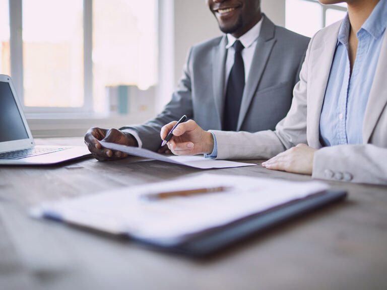 Immigration lawyers work on an immigration roadmap for their client's visa application