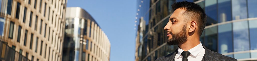 A man walking the streets to head over to his first immigration consultation