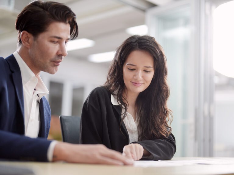 An immigrant in a meeting to prepare for visa interview