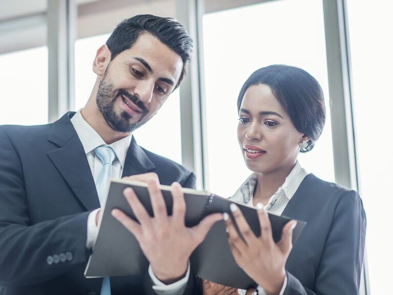 Immigration lawyers reviewing the e2 visa business